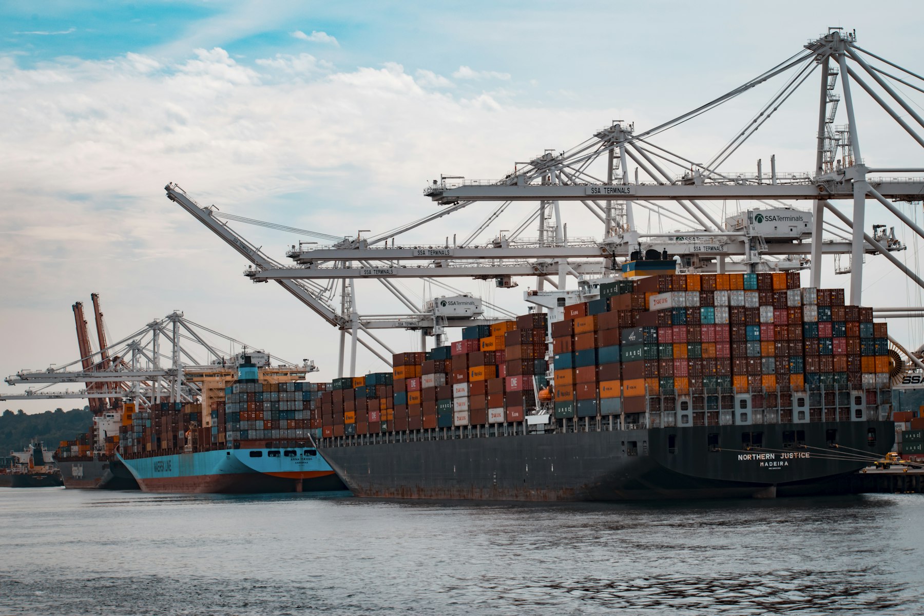 Container ships and cranes at a commercial port